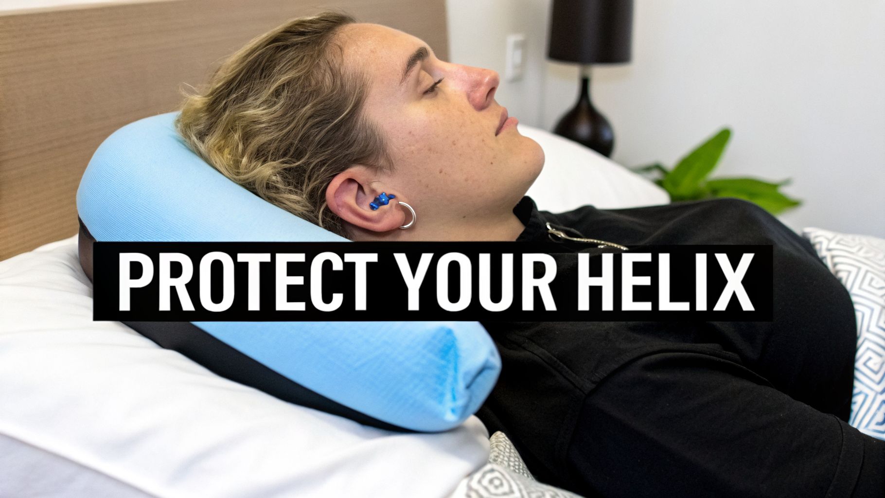 Person sleeping on their side with a specialized pillow, protecting a helix piercing.