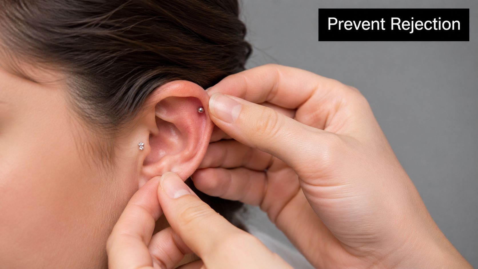 A close-up view of a professional ear piercing being inspected to prevent jewelry rejection and irritation.